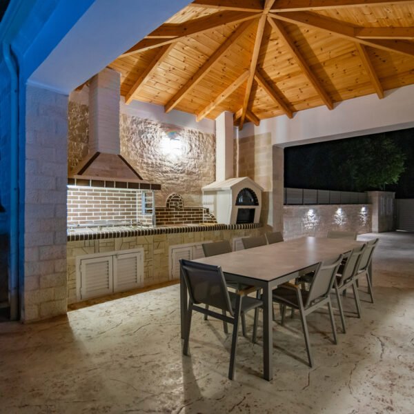 Outdoor kitchen area, night view